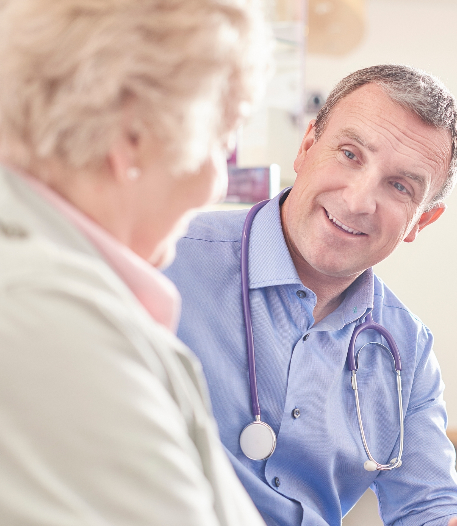 Doctor and patient in waiting room